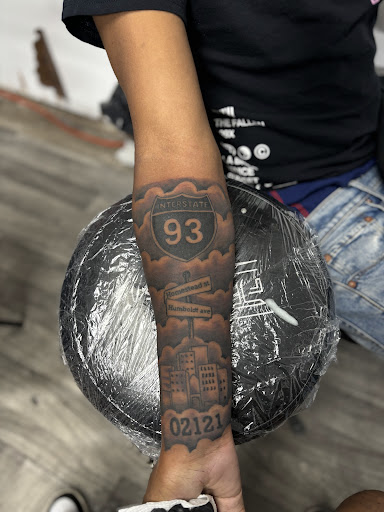 Explore guy side tattoo ideas, creative tattoo ideas in Mattapan, available at Famous Touch Tattoos