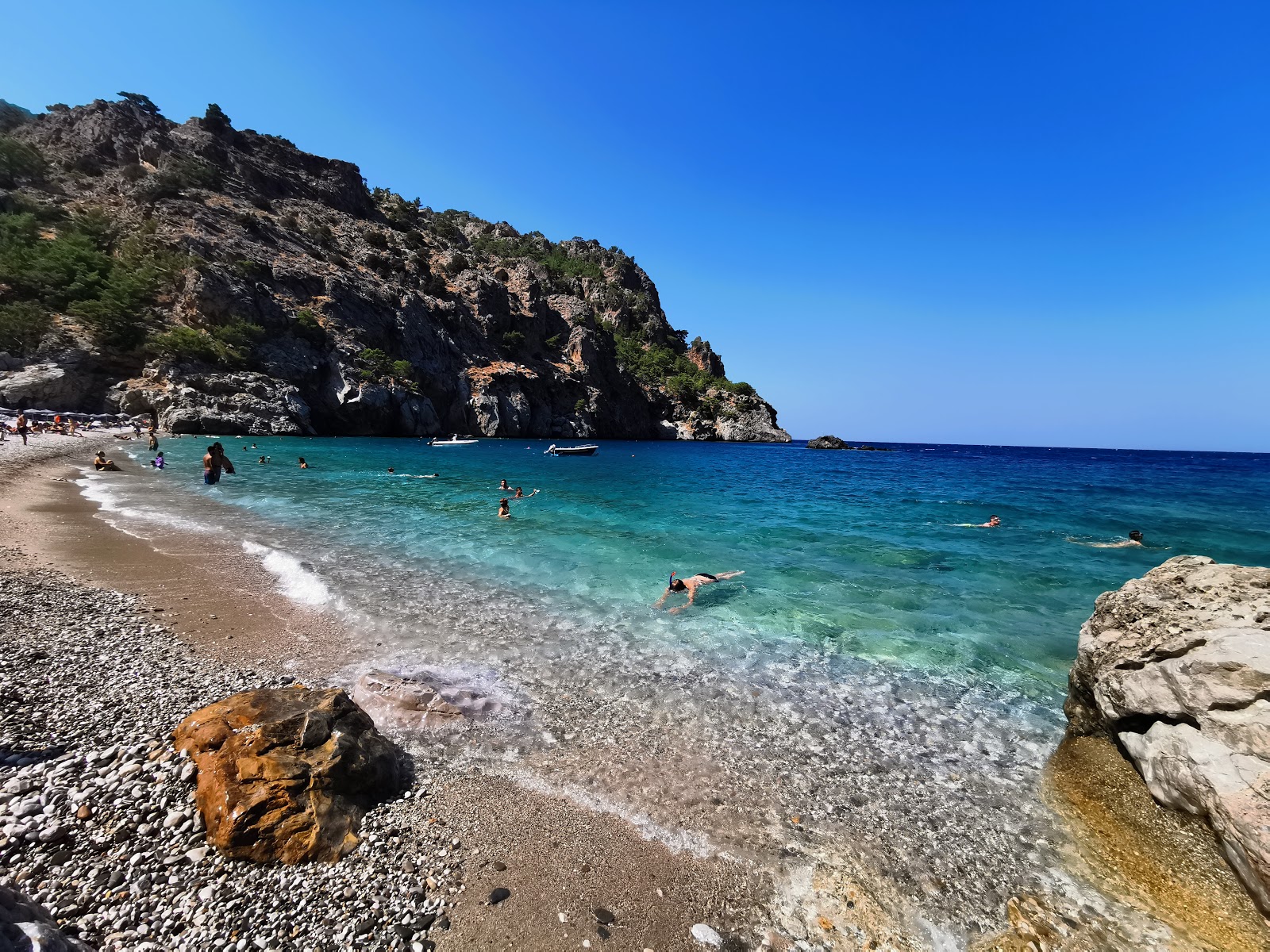Photo of Achata beach with turquoise pure water surface