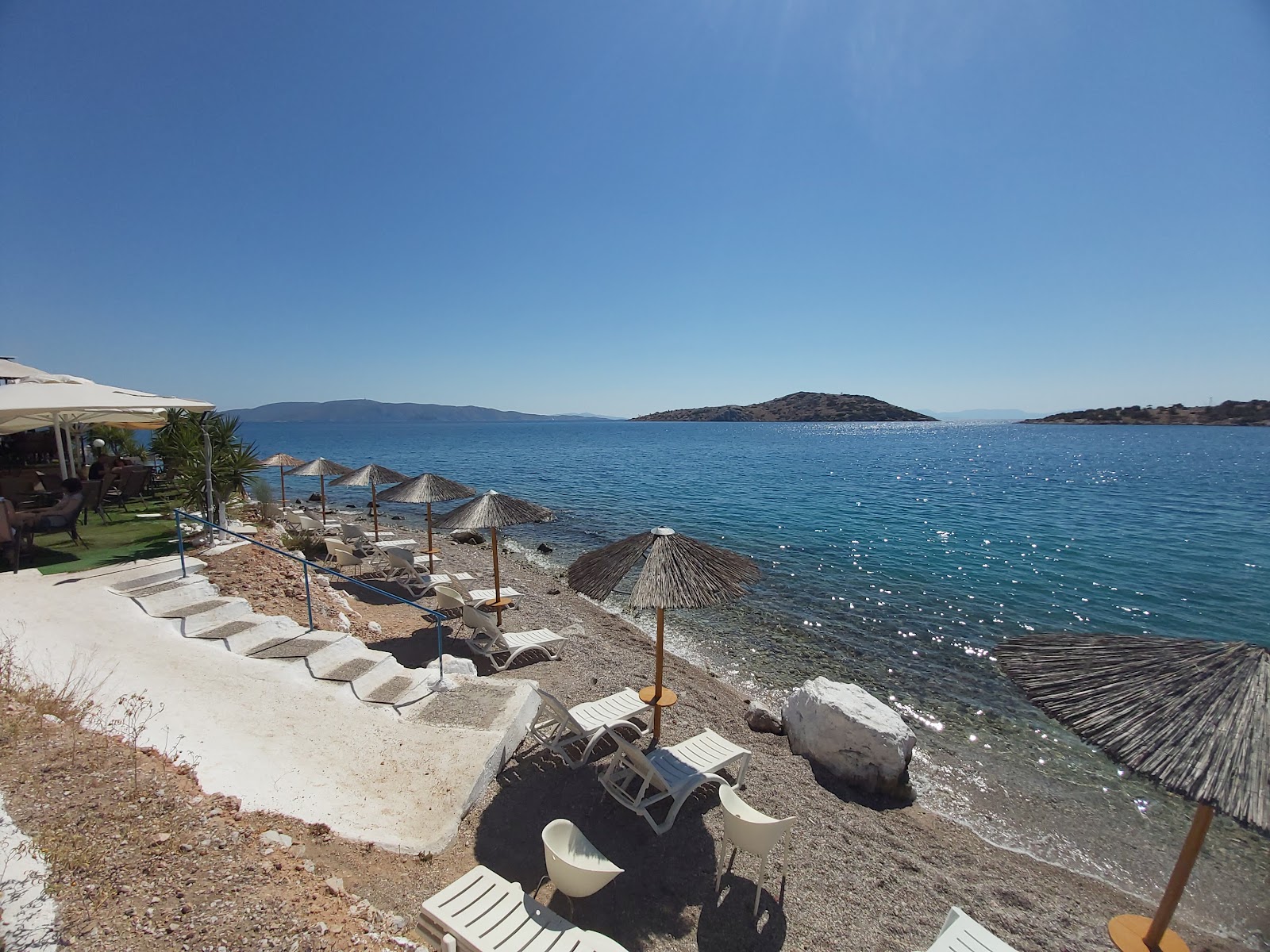 Foto von Pachi Beach mit graue kiesel Oberfläche