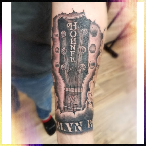 Explore stomach tattoo ideas for females, creative tattoo ideas in Lees Summit, available at Bleeding Heart Tattoo