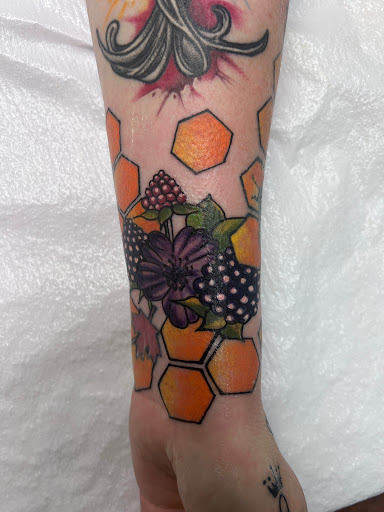 Explore street signs tattoo ideas, creative tattoo ideas in Adrian, available at Good Life Tattoo Co.