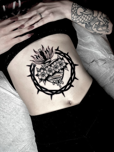 Explore laugh now cry later tattoo ideas, creative tattoo ideas in Johnson City, available at Gold Cross Tattoo Co.