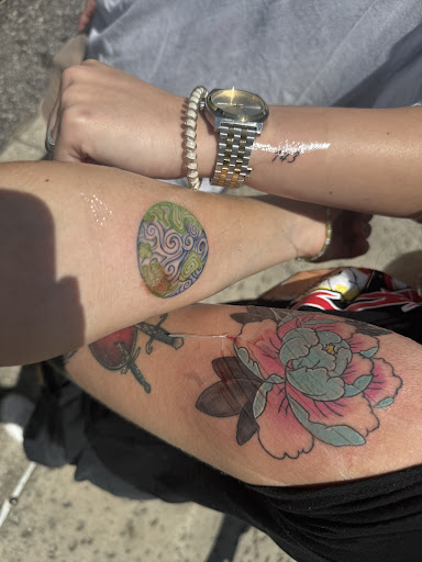 Explore finger tattoo ideas for females, creative tattoo ideas in Destin, available at Atomic Frog Tattoo