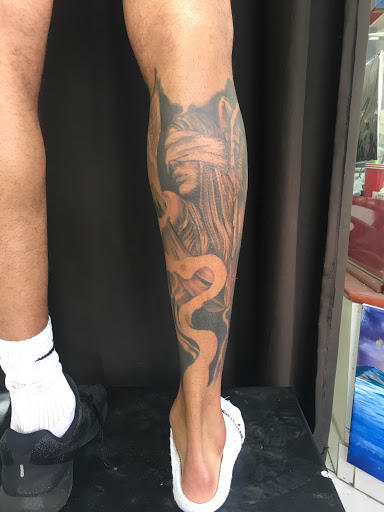 Explore five finger death punch tattoo ideas, creative tattoo ideas in Sparks, available at Tidal Wave Tattoo