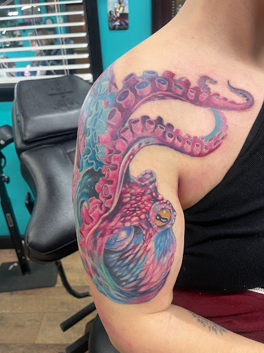 Explore script tattoo ideas for men, creative tattoo ideas in Wichita, available at Addictions In Ink