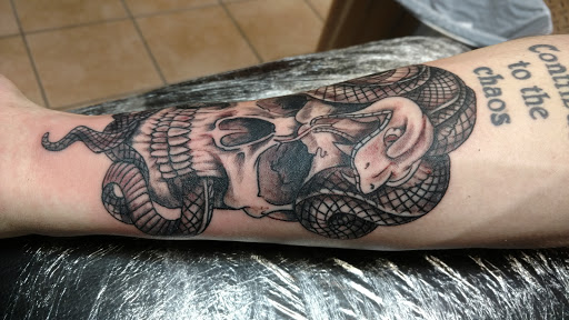 Explore elbow tattoo ideas traditional, creative tattoo ideas in Rapid City, available at Convicted Designs Tattoo & Piercing