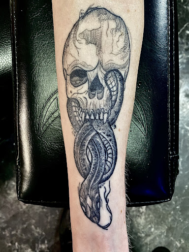 Explore side tattoo ideas for females, creative tattoo ideas in Anniston, available at Infinity Ink