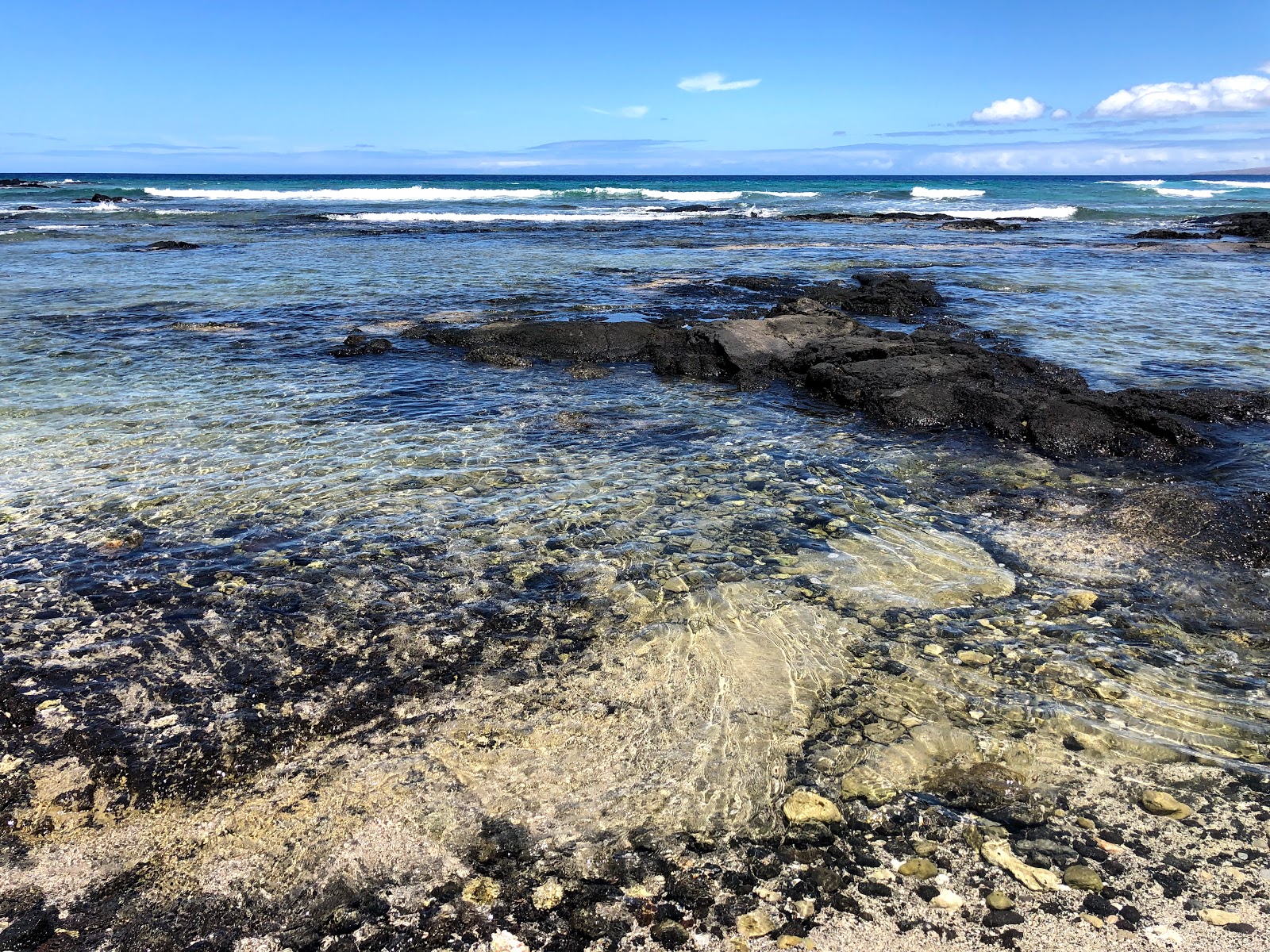 Foto van Puako Beach met turquoise puur water oppervlakte