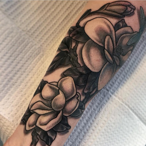 Explore mens rib tattoo ideas, creative tattoo ideas in Saint Paul, available at Black Coffin Tattoo