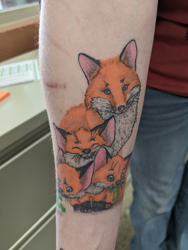 Explore upper back tattoo cover up ideas, creative tattoo ideas in Bremen, available at Third Planet Tattoos