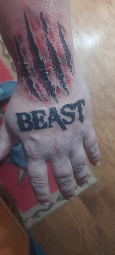 Explore forehead tattoo ideas, creative tattoo ideas in Magnolia, available at Lucky Sparrow Tattoo Shop and Piercing