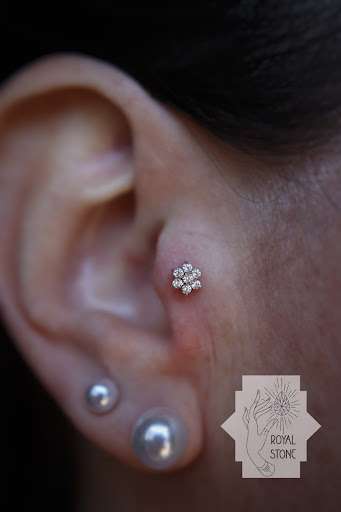 Explore wedding ring tattoo cover up ideas, creative tattoo ideas in Mobile, available at Royal Stone Piercing