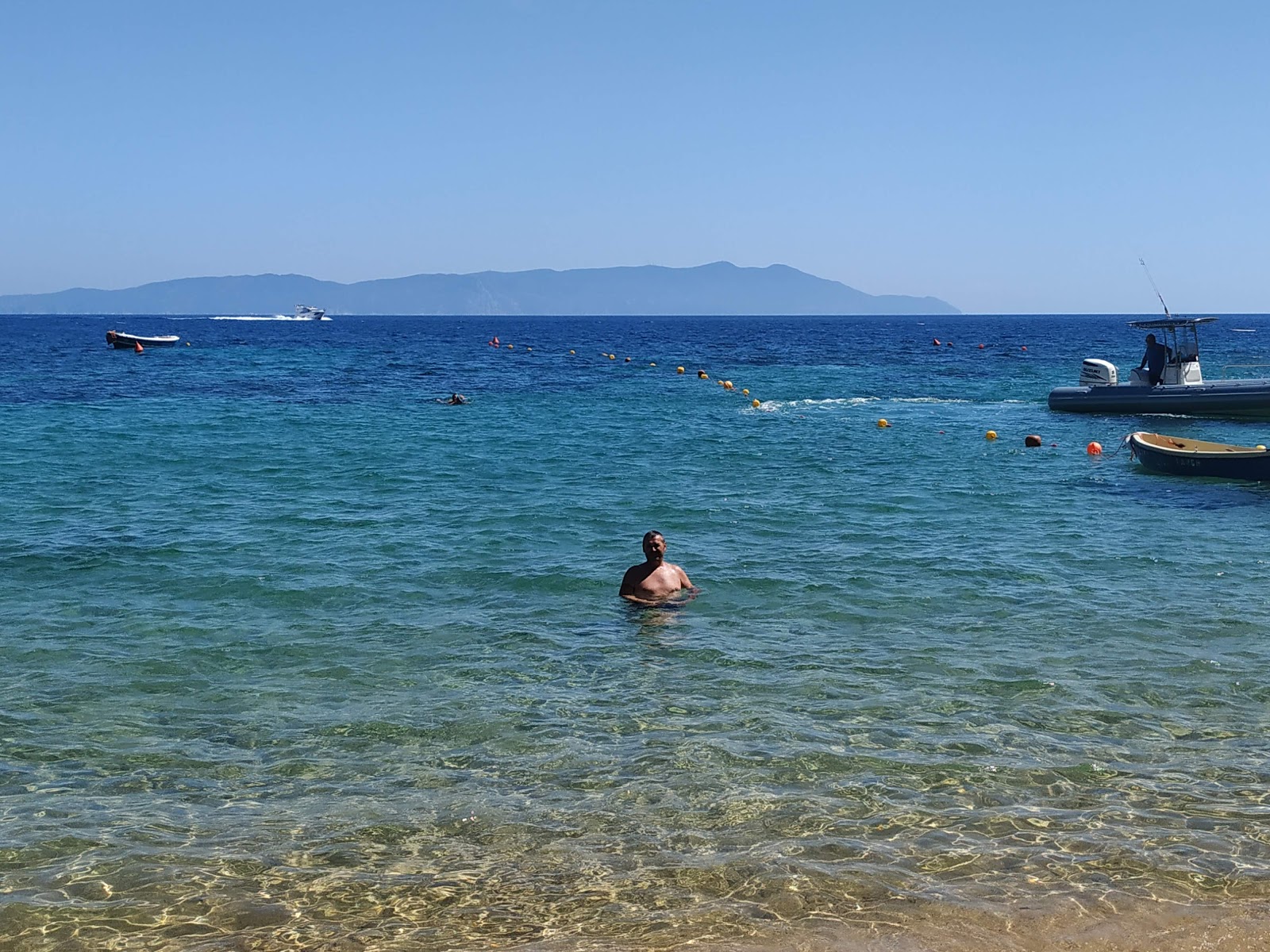 Caldane Plajı'in fotoğrafı - tatil için iyi evcil hayvan dostu nokta