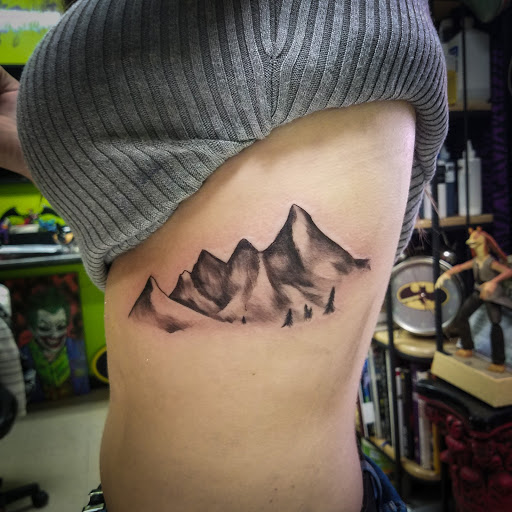 Explore red tattoo cover up ideas, creative tattoo ideas in Kingsport, available at Ink-a-zoid Tattoos & Piercings