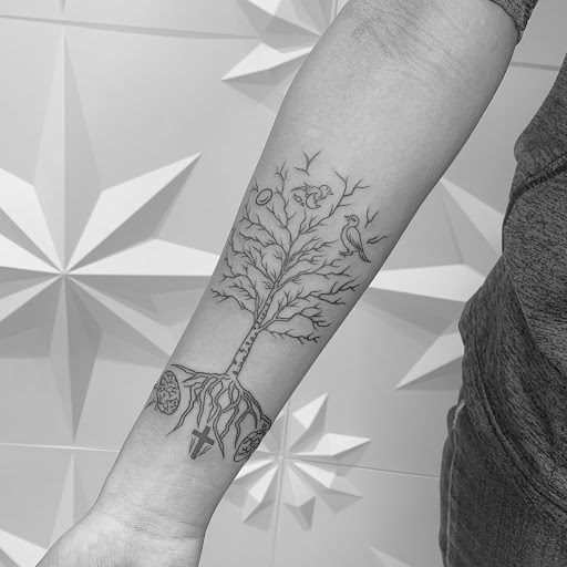 Explore mirrored tattoo ideas, creative tattoo ideas in Fairfax, available at Pinky Inky Tattoo