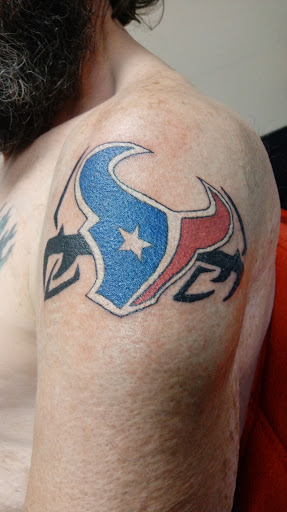 Explore punk tattoo ideas, creative tattoo ideas in Onalaska, available at Divine Designs tattoo studio