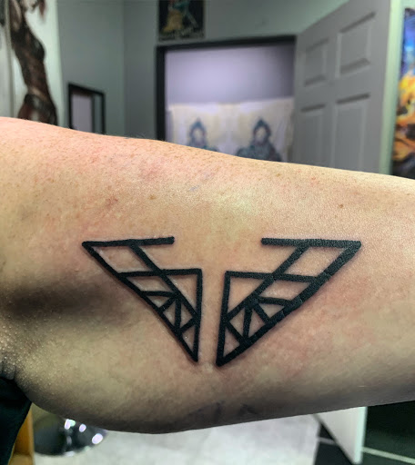 Explore tattoo ideas for young men, creative tattoo ideas in Hudson Falls, available at ALTERED ADDICTION TATTOOS