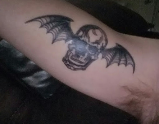 Explore triskelion tattoo ideas, creative tattoo ideas in Foley, available at Symbolic Ink Tattoo Studio