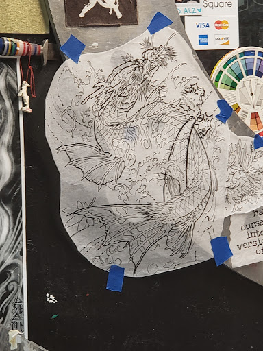 Explore tattoo cover up ideas for hand, creative tattoo ideas in Bakersfield, available at Naked Als Tattoos & Piercing