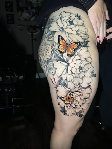 Find small tattoo between breast ideas for your next unique tattoo in Roanoke at Saint Cecilias Art Studio