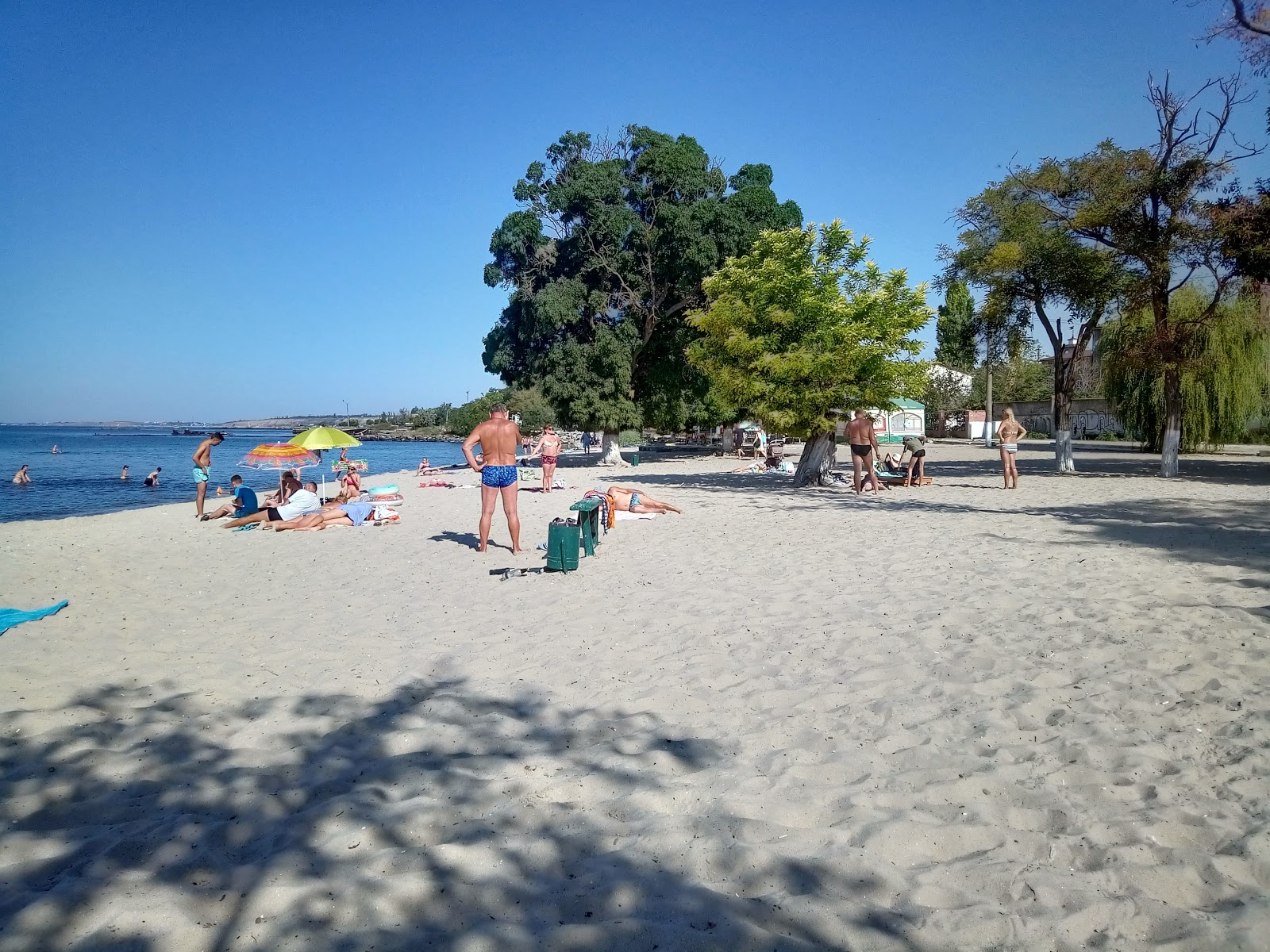 Fotografija Ochakov Plyazh z svetel pesek površino