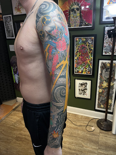 Explore tattoo ideas for legs, creative tattoo ideas in North Charleston, available at Breakthrough Tattoo