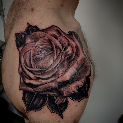 Explore batman logo tattoo ideas, creative tattoo ideas in Mount Clemens, available at Hand & Heart Tattoo