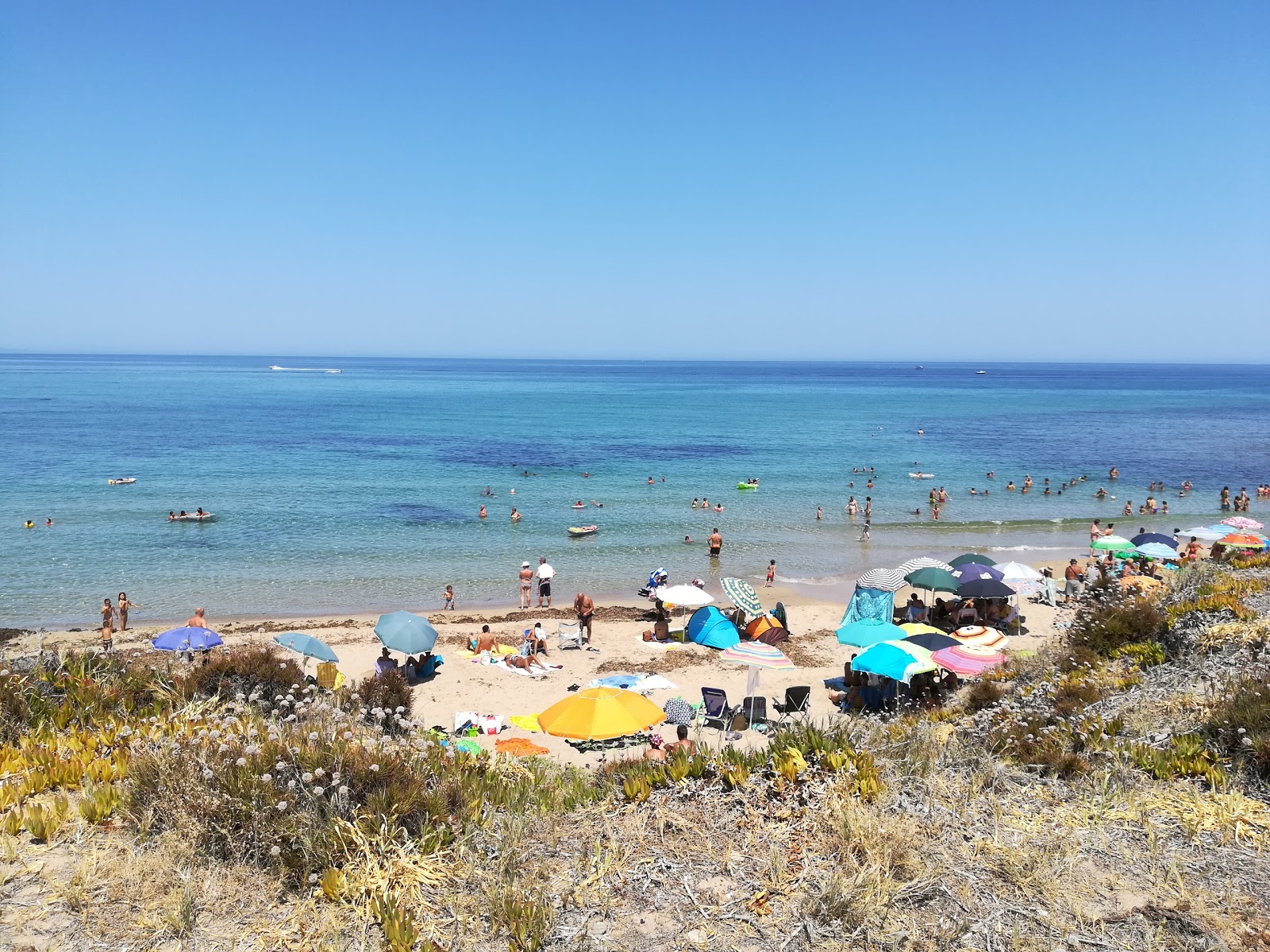 Foto van Spiaggia lu Bagnu met hoog niveau van netheid