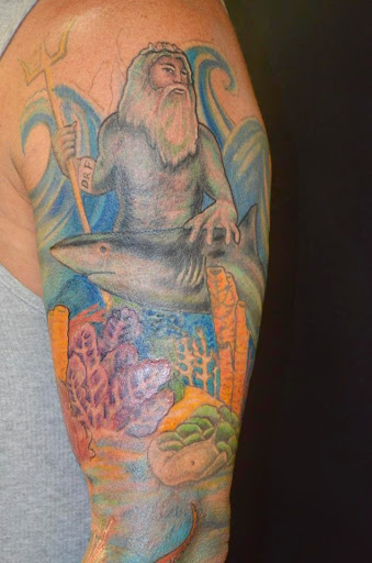 Find inbetween boob tattoo ideas for your next unique tattoo in North Palm Beach at Triton Tattoo North Palm Beach