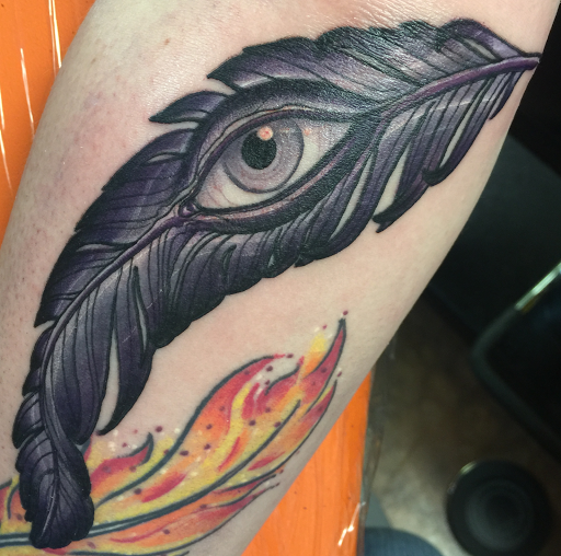 Explore black tattoo ideas for men, creative tattoo ideas in Batavia, available at A Thin Line Tattoo