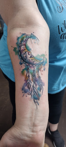 Explore female tattoo ideas for arm, creative tattoo ideas in Oklahoma City, available at Mind Bender Tattoo
