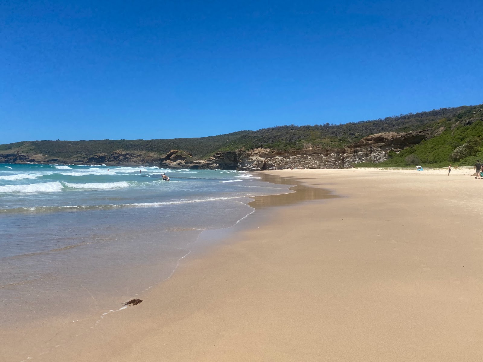 Foto de Ghosties Beach con arena fina beige superficie