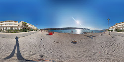 Photo de Tanja beach protégé par des falaises
