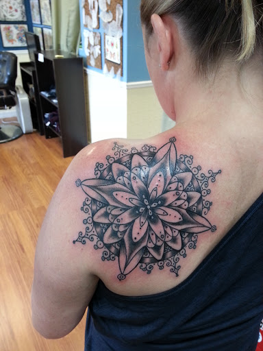 Explore little hand tattoo ideas, creative tattoo ideas in Egg Harbor Township, available at Mr. Blue Sky Tattoo