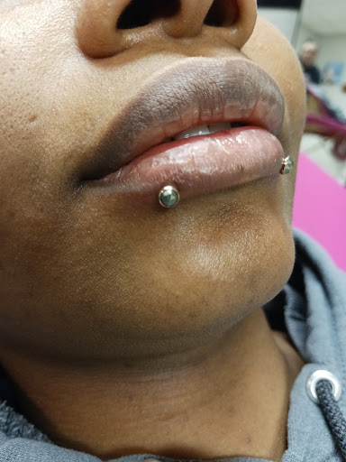 Explore fist tattoo ideas, creative tattoo ideas in Memphis, available at Rose Quartz Body Adornment LLC