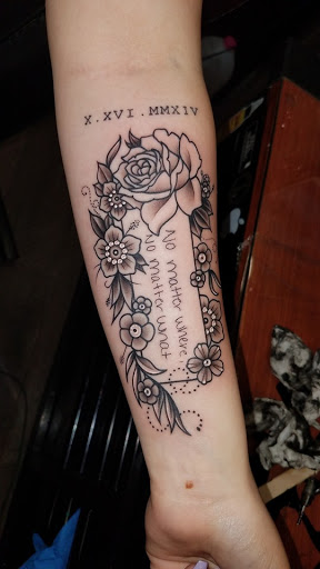 Explore solar eclipse tattoo ideas, creative tattoo ideas in Utica, available at Red Raven Tattoo and Body Piercing