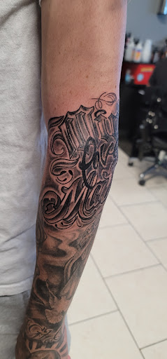 Explore tattoo ideas for letter s, creative tattoo ideas in Ocoee, available at Slaughterized Ink Tattoo and Piercing Studio