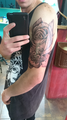 Explore back shoulder tattoo ideas, creative tattoo ideas in Salt Lake City, available at Big Deluxe Tattoo