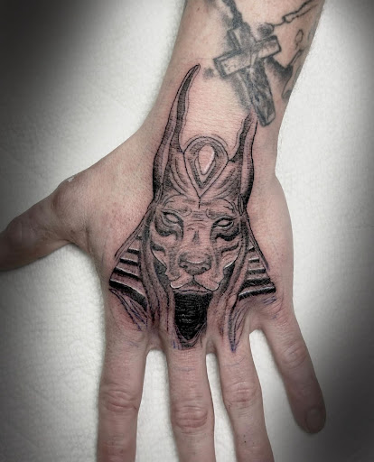 Explore tattoo ideas for wrist cover up, creative tattoo ideas in Newfield, available at Parabellum Tattoo Studio