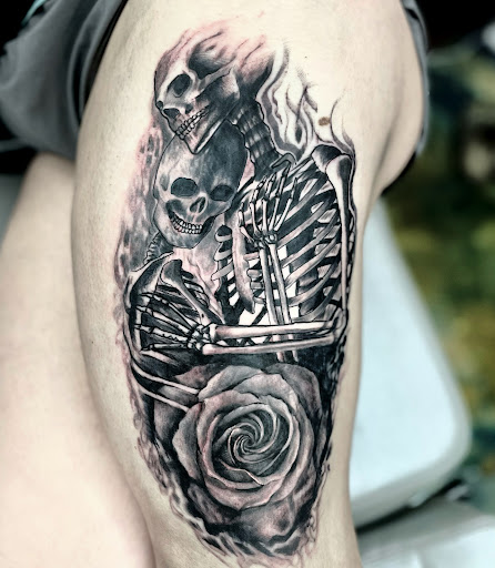 Explore tramp stamp lower back tattoo cover up ideas, creative tattoo ideas in Bowling Green, available at 31 Ink Tattoo Parlor