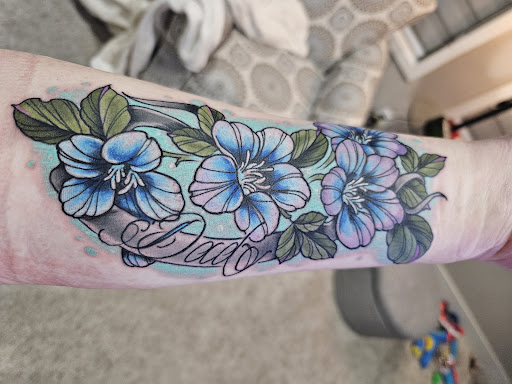 Explore music tattoo ideas for females, creative tattoo ideas in Omaha, available at Ironwood Ink