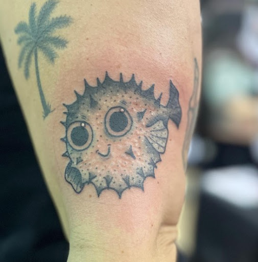 Explore thigh tattoo idea, creative tattoo ideas in Woodstock, available at Lost Lagoon Tattoo