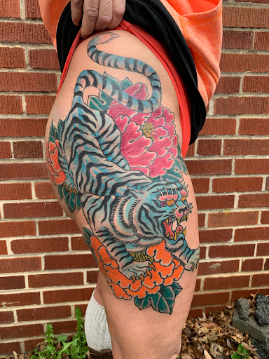 Explore mom tattoo ideas for son, creative tattoo ideas in Strasburg, available at Champion Tattoo Company