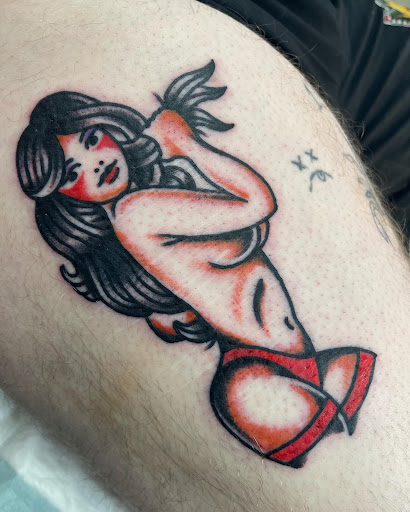 Explore queen of hearts tattoo ideas, creative tattoo ideas in Johnson City, available at Gold Cross Tattoo Co.