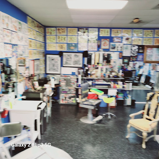 Explore roman numeral tattoo ideas for females, creative tattoo ideas in Englewood, available at The Original Big Daddy Tattoo & Body Piercing est.1997 est.1997