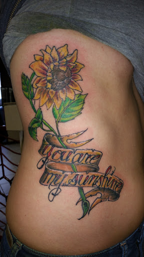 Explore minimalist sibling tattoo ideas, creative tattoo ideas in Fort Mohave, available at RedRum Tattoo & Body Piercing Co.
