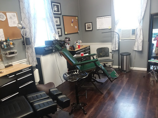 Explore orchid tattoo ideas, creative tattoo ideas in Mchenry, available at Art and Soul Tattoo Company