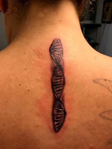 Explore back tattoo ideas for women, creative tattoo ideas in Seymour, available at American Gypsy Tattoo Corp.