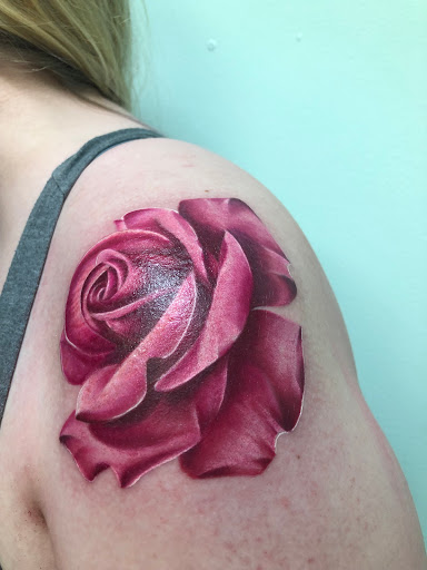 Explore chest shoulder tattoo ideas, creative tattoo ideas in Kenosha, available at Kenosha Tattoo Company