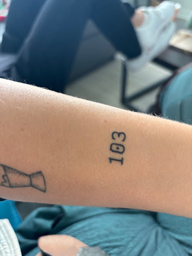 Explore name cover up tattoo ideas for men, creative tattoo ideas in Davenport, available at Fine Ink Studios Tattoos